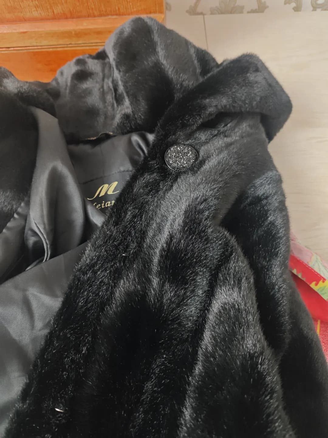 Fur coat with a hood for sale
