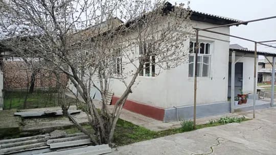 A house with a courtyard is for sale. In the Telegraph,
