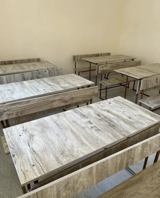 School desks and chairs are for sale.