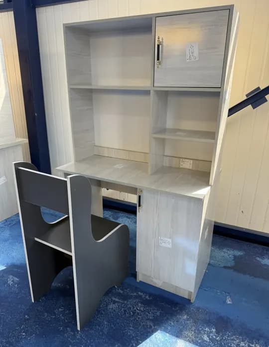 A modern single study table is for sale.